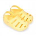 Kids jelly shoes with OLA MC CLOG design for beach and pool use.