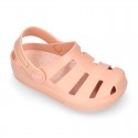 Kids jelly shoes with OLA MC CLOG design for beach and pool use.