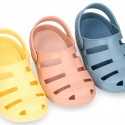 Kids jelly shoes with OLA MC CLOG design for beach and pool use.