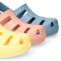 Kids jelly shoes with OLA MC CLOG design for beach and pool use.