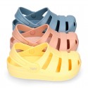 Kids jelly shoes with OLA MC CLOG design for beach and pool use.