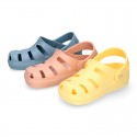 Kids jelly shoes with OLA MC CLOG design for beach and pool use.