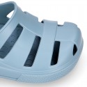 Kids jelly shoes with OLA MC CLOG design for beach and pool use.