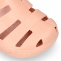 Kids jelly shoes with OLA MC CLOG design for beach and pool use.
