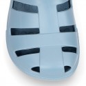 Kids jelly shoes with OLA MC CLOG design for beach and pool use.