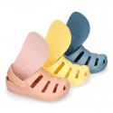 Kids jelly shoes with OLA MC CLOG design for beach and pool use.