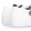 Cotton canvas girl Mary Jane shoes with hook and loop strap closure with FLOWER design.