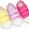 Cotton Canvas OKAA Girl Sneaker laceless and with toe cap design.