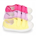 Cotton Canvas OKAA Girl Sneaker laceless and with toe cap design.