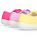 Cotton Canvas OKAA Girl Sneaker laceless and with toe cap design.