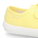 Cotton Canvas OKAA Girl Sneaker laceless and with toe cap design.