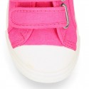 Cotton Canvas OKAA Girl Sneaker laceless and with toe cap design.