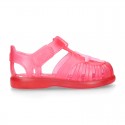 Classic style Kids jelly shoes with hook and loop strap closure and STARFISH design.