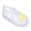 Classic style Kids jelly shoes with hook and loop strap closure and STARFISH design.