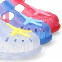 Classic style Kids jelly shoes with hook and loop strap closure and STARFISH design.