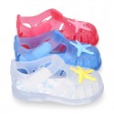 Classic style Kids jelly shoes with hook and loop strap closure and STARFISH design.