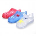 Classic style Kids jelly shoes with hook and loop strap closure and STARFISH design.