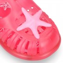 Classic style Kids jelly shoes with hook and loop strap closure and STARFISH design.