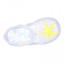 Classic style Kids jelly shoes with hook and loop strap closure and STARFISH design.