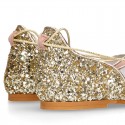 Woman Sandal shoes with ties closure in soft suede leather with gold GLITTER.