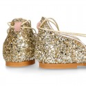 Woman Sandal shoes with ties closure in soft suede leather with gold GLITTER.