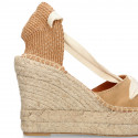 Suede leather wedge woman espadrilles shoes with ribbons closure.