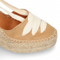 Suede leather wedge woman espadrilles shoes with ribbons closure.