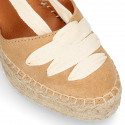 Suede leather wedge woman espadrilles shoes with ribbons closure.