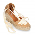 Suede leather wedge woman espadrilles shoes with ribbons closure.