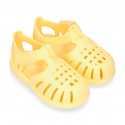 Classic Kids jelly shoes for Beach and Pool use in new SOLID colors with hook and loop strap closure.