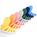 SNEAKER style kids jelly shoes with hook and loop strap in solid colors.