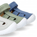 PIQUE cotton canvas kids sandal shoes with hook and loop strap closure.