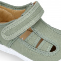 PIQUE cotton canvas kids sandal shoes with hook and loop strap closure.