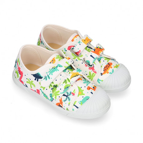 Cotton canvas Kids Tennis shoes laceless with DINOS design with toe cap.