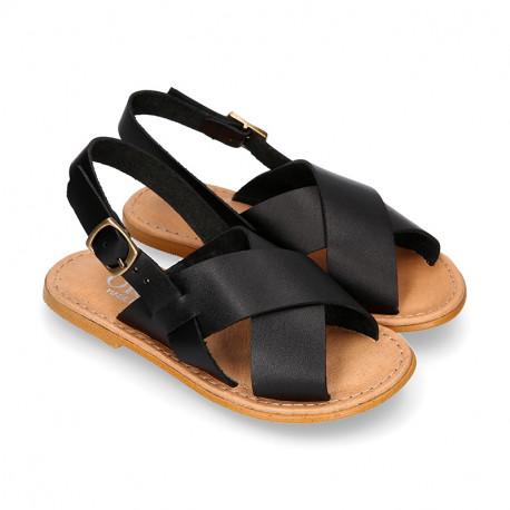 BLACK color leather Kids sandal shoes with crossed straps design.