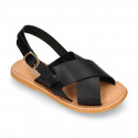 BLACK color leather Kids sandal shoes with crossed straps design.