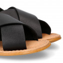 BLACK color leather Kids sandal shoes with crossed straps design.