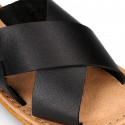 BLACK color leather Kids sandal shoes with crossed straps design.