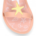 Girl Jelly shoes T-Strap sandal style with STARFISH design in pink color.