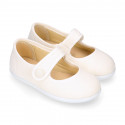 Cotton Canvas Merceditas or Mary Jane style shoes with hook and loop strap and button.