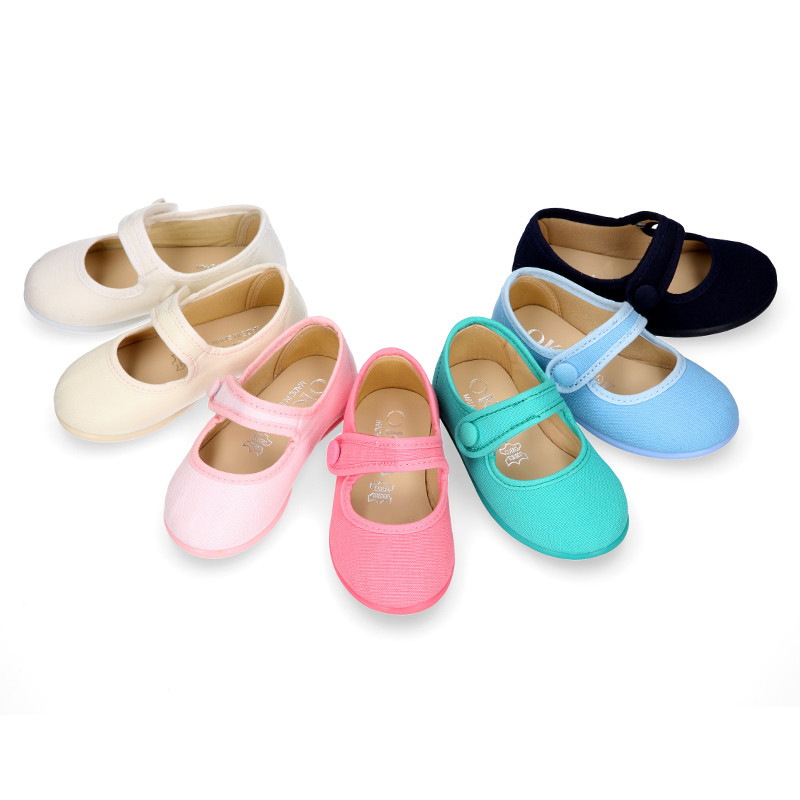 Mercedita estilizada cierre con botón en Lona.