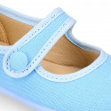 Cotton Canvas Merceditas or Mary Jane style shoes with hook and loop strap and button.