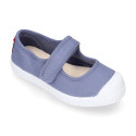 Cotton canvas Mary Janes Bamba type shoes in seasonal colors with hook and loop strap and toe cap.