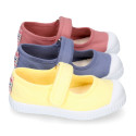 Cotton canvas Mary Janes Bamba type shoes in seasonal colors with hook and loop strap and toe cap.