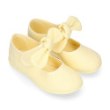 Cotton canvas Girl Mary Jane shoes with hook and loop strap and big bow design.