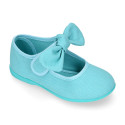 Cotton canvas Girl Mary Jane shoes with hook and loop strap and big bow design.