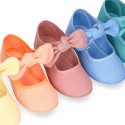 Cotton canvas Girl Mary Jane shoes with hook and loop strap and big bow design.