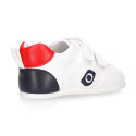 White color OKAA FLEX tennis kids shoes laceless and with zero drop.