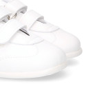 White color OKAA FLEX tennis kids shoes laceless and with zero drop.