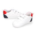 White color OKAA FLEX tennis kids shoes laceless and with zero drop.